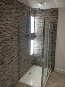 247 Plumbing Solutions of Larkfield, Kent. Beautiful barn bathroom install including plastering, fixtures, shower, flooring, tiling and plumbing in Wrotham, Kent.
